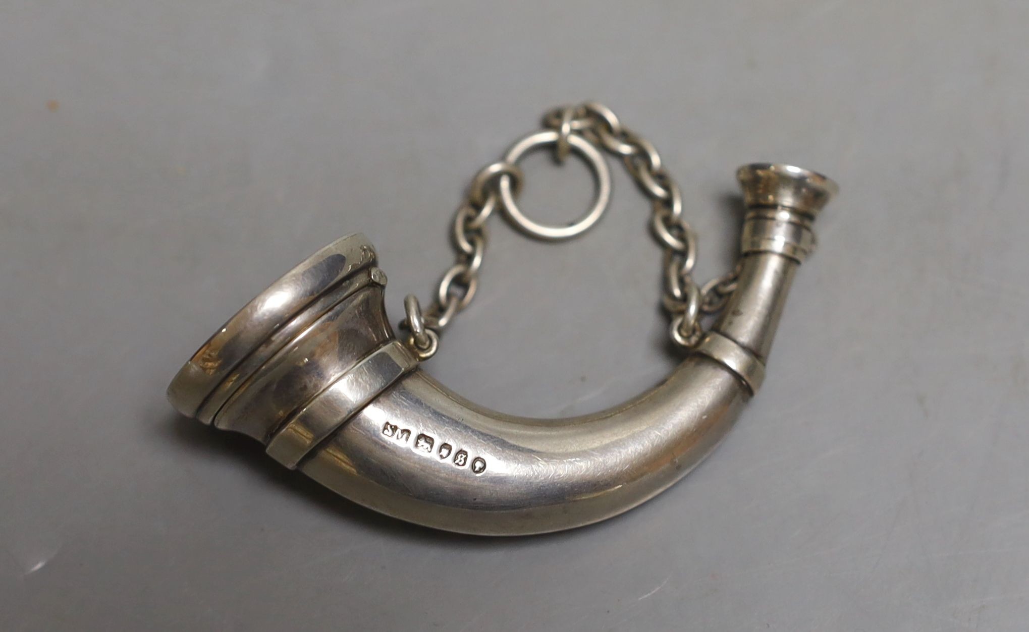 A Victorian novelty silver vinaigrette, modelled as a hunting horn, Sampson Mordan & Co, London, 1873, 76mm.